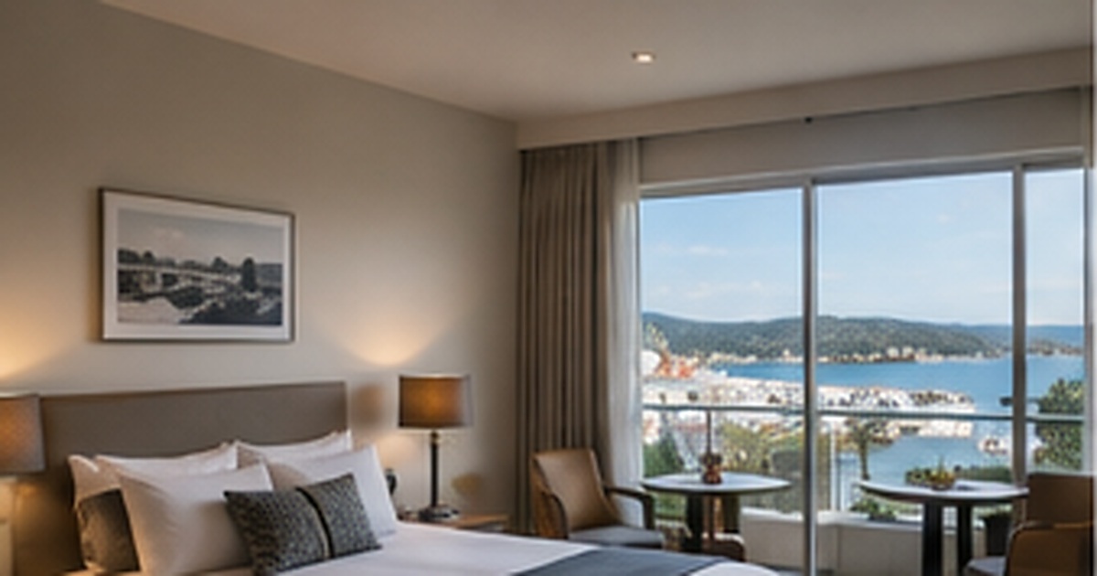 Traveller checking hotel details online in an Albany-inspired coastal hotel room before confirming a stay